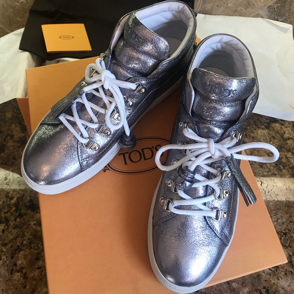 BRAND NEW IN BOX Tod’s mid top sneakers make offer